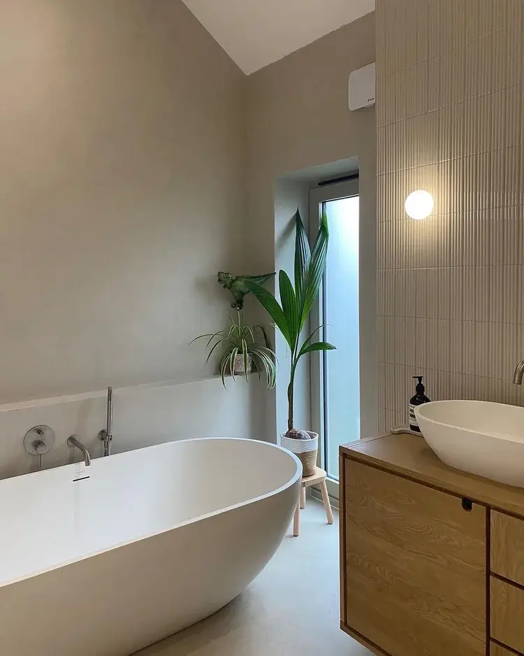 Vanity area with microcement walls and matte sealed surface — Hampton