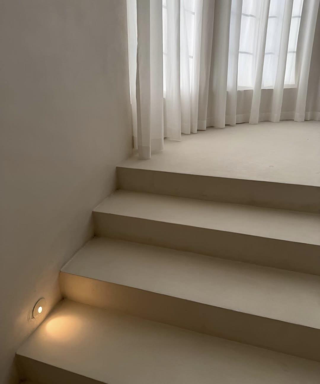 Full view of microcement staircase with seamless treads, risers and side walls — Toorak