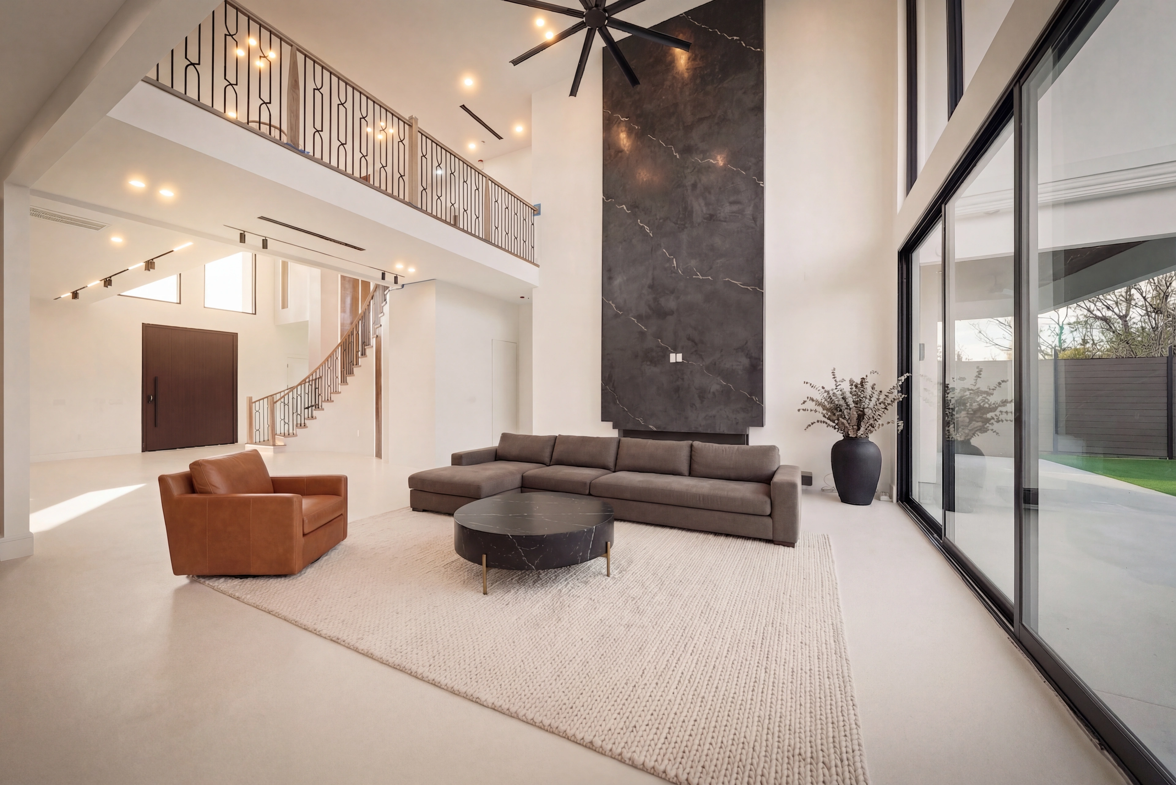 Microcement living room and staircase installation by MicroLux Finishes Melbourne